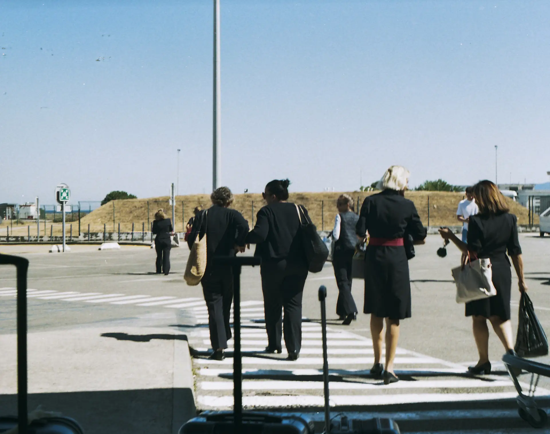 Stewardesses outside of airport, Corse